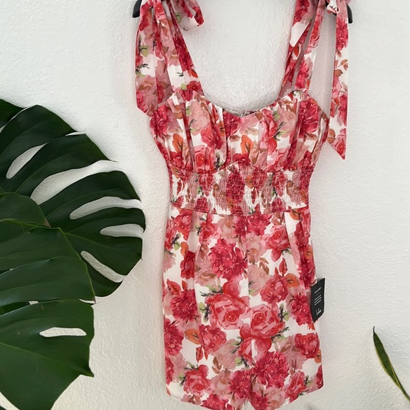 Bloom Bright Pink Floral
Print Tie-Strap Smocked Romper - Picture 4 of 10